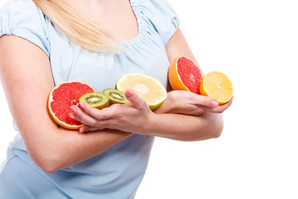 Woman holding fruits kiwi. orange, lemon and grapefruit — Stock Photo, Image