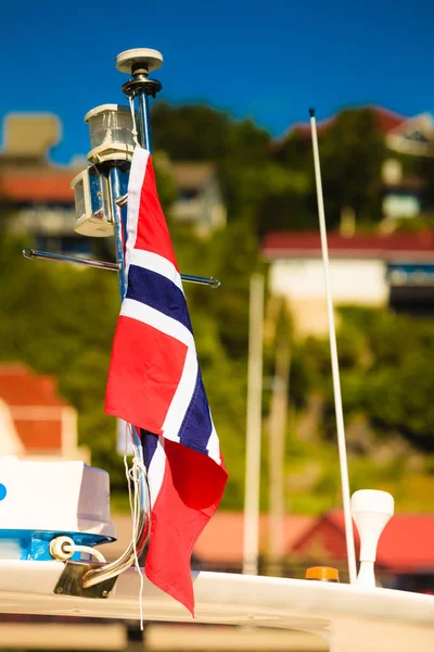 Norwegian flag city street in the background