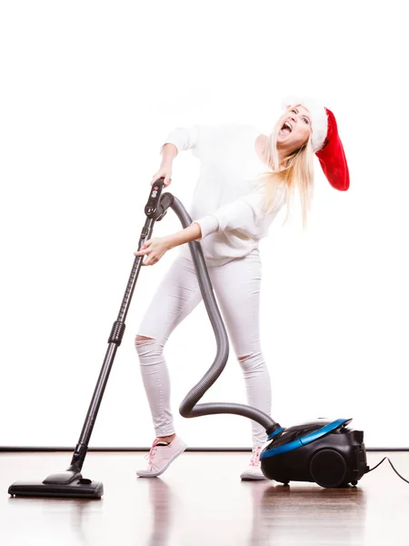 Fille dans santa helper chapeau avec aspirateur — Photo