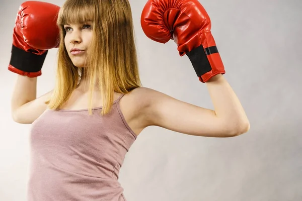 Woman wearing boxing gloves — Stock Photo, Image