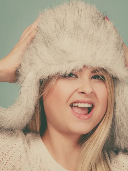 Blonde woman in winter furry hat — Stock Photo, Image