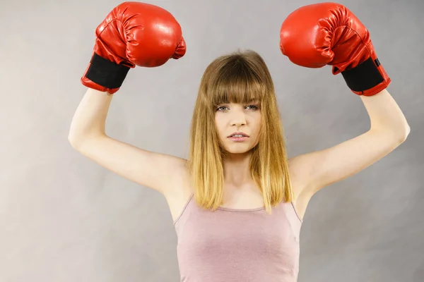 Woman wearing boxing gloves — Stock Photo, Image