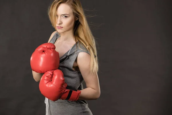 Beautiful woman with red boxing gloves — Stock Photo, Image