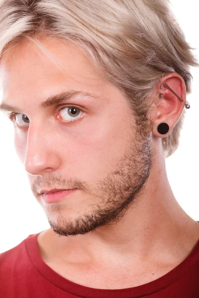 Teen boy with piercing and fashionable hairstyle — Stock Photo, Image