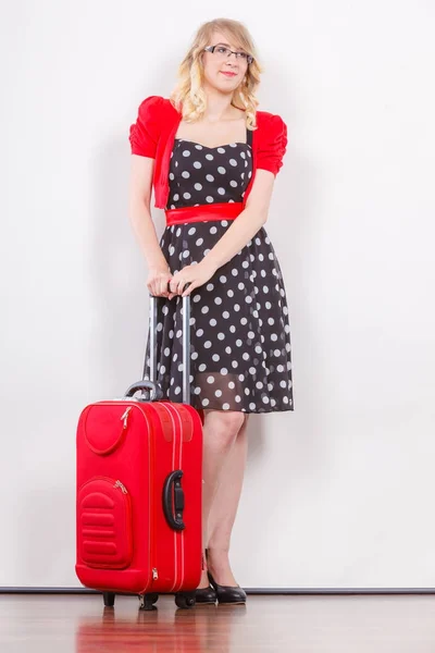 Elegant fashion woman with red suitcase — Stock Photo, Image