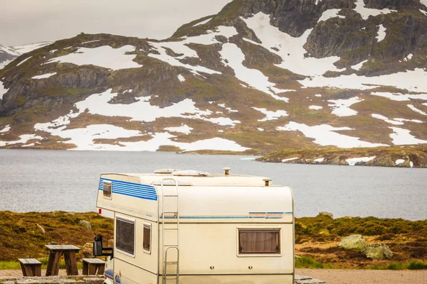 Camper car in norwegian mountains