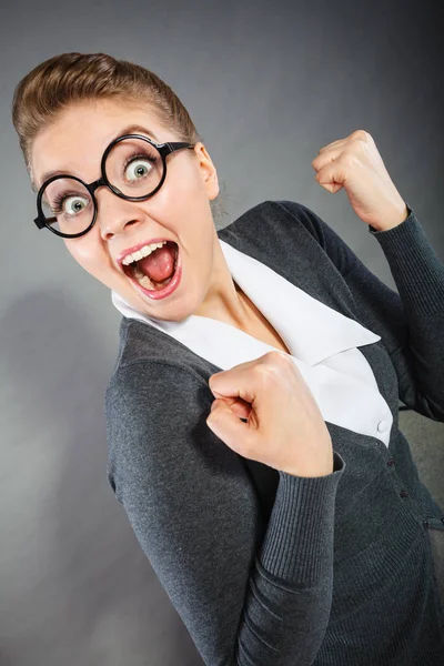 Cheerful office lady expressing joy.