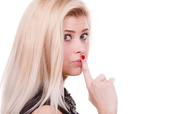 Attractive blonde woman making silence gesture — Stock Photo, Image