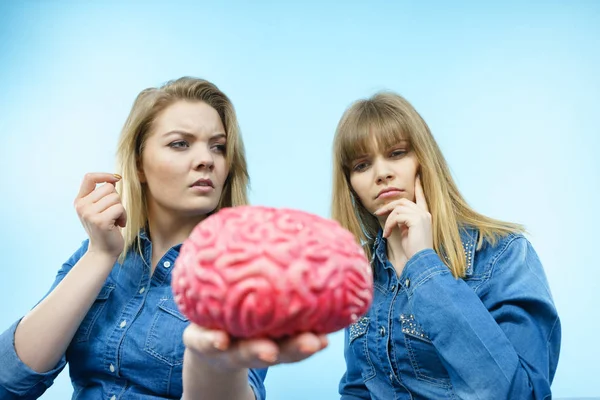 Two women friends thinking — Stock Photo, Image