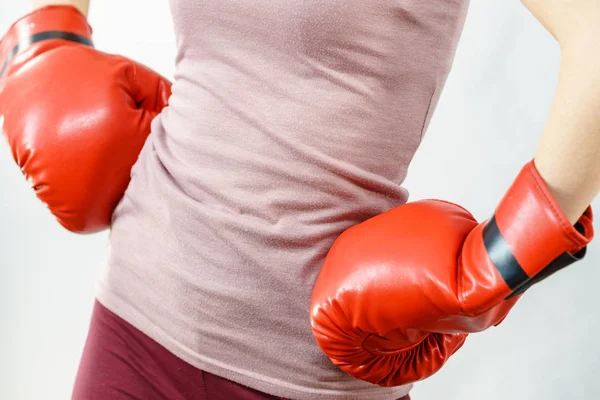 Woman wearing boxing gloves — Stock Photo, Image