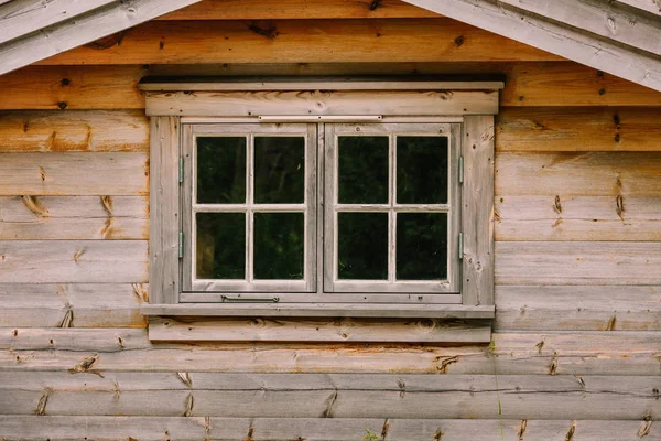 Old vintage dark wooden window, rural design concept.