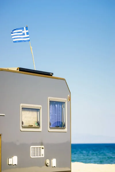 Camping truck with Greek flag