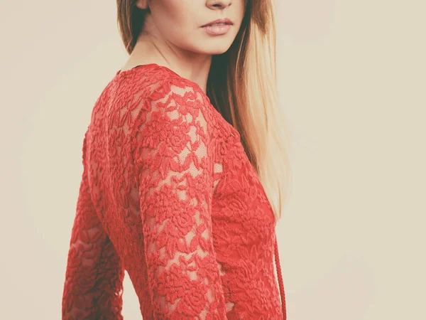 Elegant young woman wearing red top — Stock Photo, Image