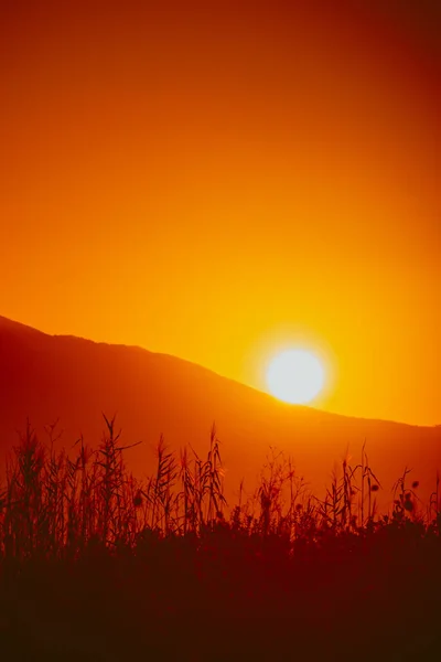 Sunrise over mountain hill — Stock Photo, Image