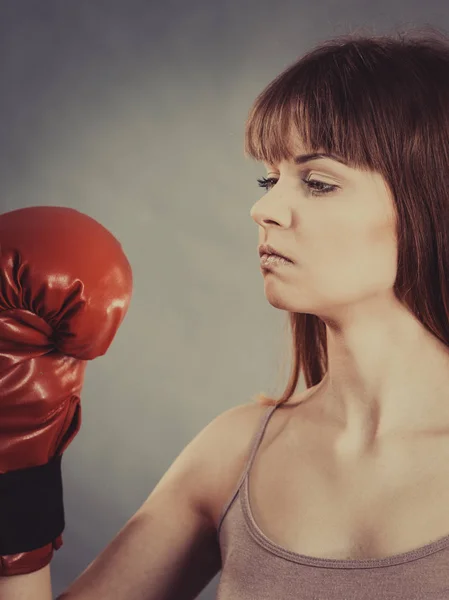 Woman wearing boxing gloves — Stock Photo, Image