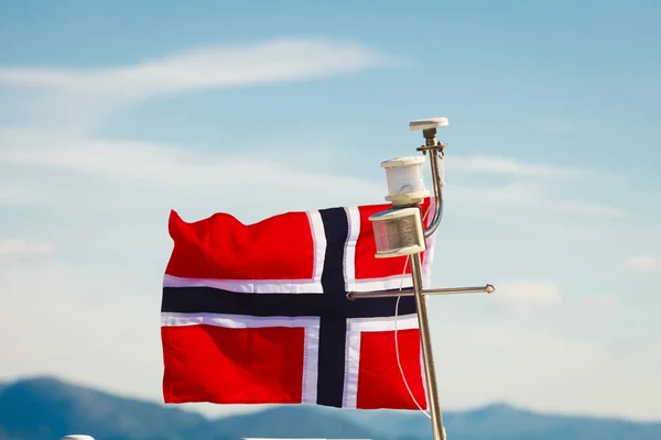 Norwegian flag on yacht mast