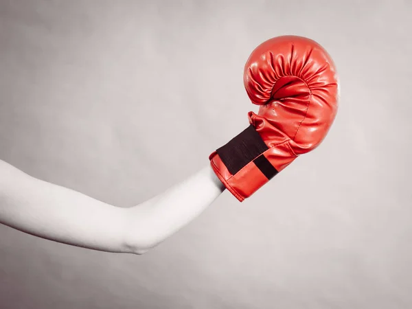 Woman wearing red boxing gloves — Stock Photo, Image