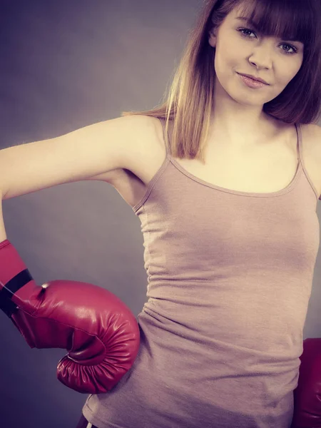 Woman wearing boxing gloves — Stock Photo, Image