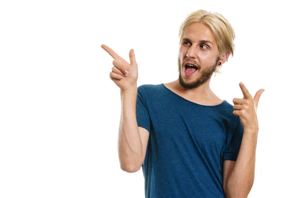 Young man laughing pointing with fingers — Stock Photo, Image