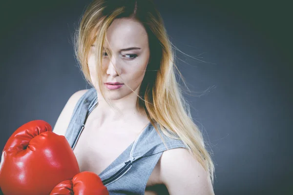 Beautiful woman with red boxing gloves — Stock Photo, Image