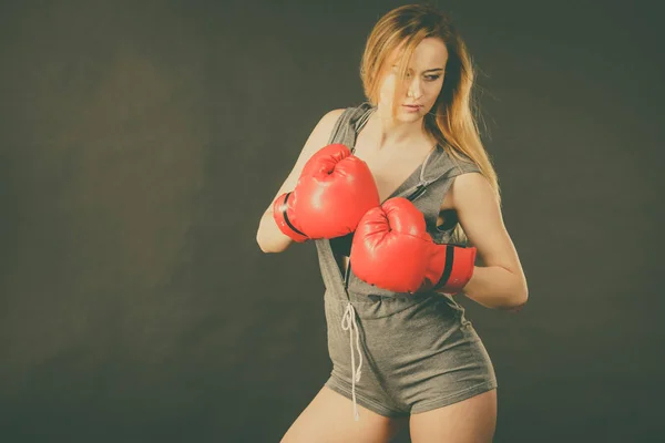 Beautiful woman with red boxing gloves — Stock Photo, Image