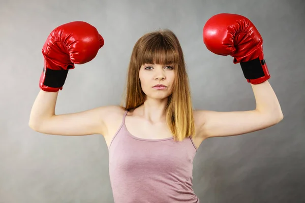 Woman wearing boxing gloves — Stock Photo, Image