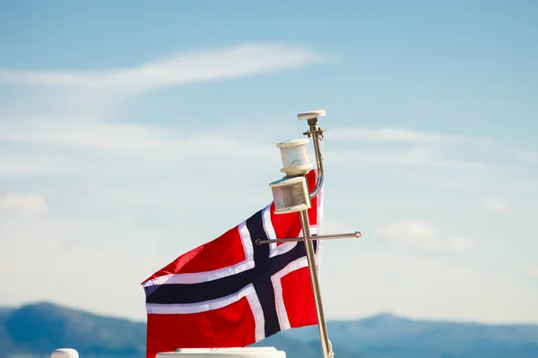 Norwegian flag on yacht mast