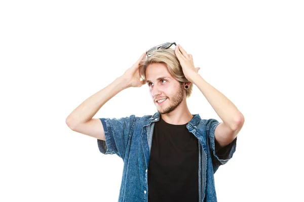 Man with glasses on head looking into space — Stock Photo, Image