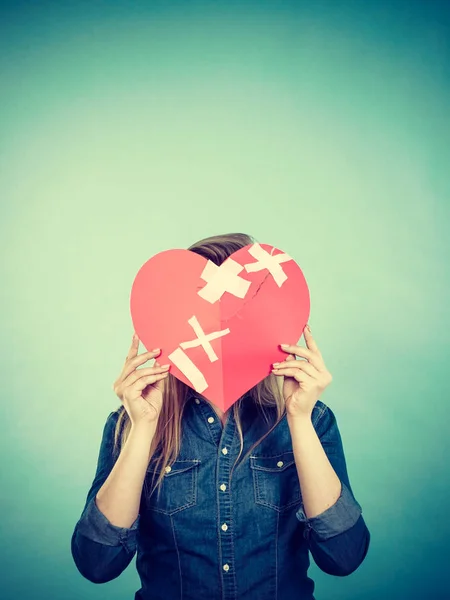 Young woman with broken heart — Stock Photo, Image