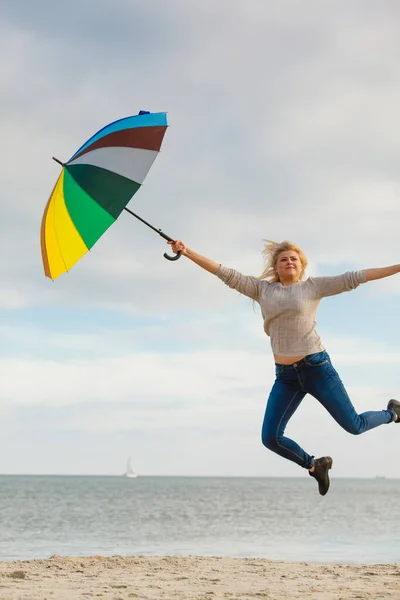 Happiness Enjoying Weather Feeling Great Concept Woman Jumping Colorful Umbrella — Stock Photo, Image