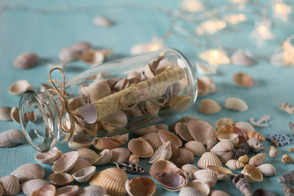 Bottle with a message, seashells. 