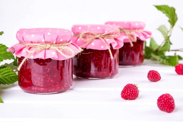 Jars Raspberry Jam Placed Rows Fresh Raspberry White Wooden Table — Stock Photo, Image