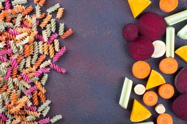 Achtergrond Van Heldere Kleurrijke Droge Pasta Gemaakt Van Groenten Haar — Stockfoto