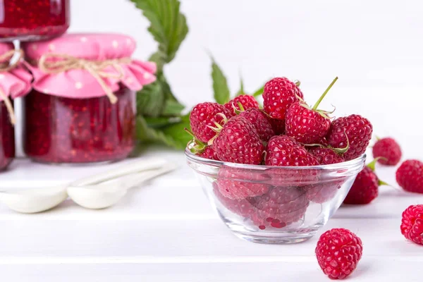 Red Fresh Raspberries Glass Bowl Green Leaves White Background — Stock Photo, Image