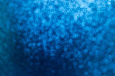 Bulanık soyut desen, mavi arkaplan yumuşak parıltılı bokeh ışıkları