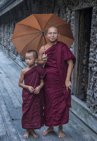 Monks at Shwenandaw Monastery in Mandalay , Myanmar