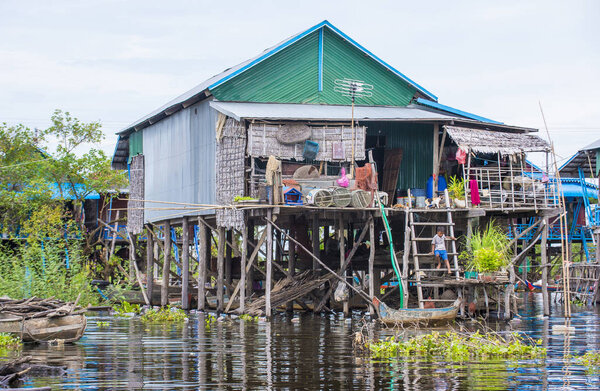 Traditional wooden stilt houses in Tonle sap lake Cambodia