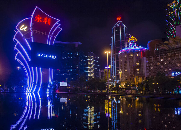 MACAU - DEC 30 : The Macau skyline at night on December 30 2019 . Macau is an autonomous region on the south coast of China
