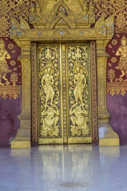 Luang Prabang, Laos - 10 Ağustos: Luang Prabang 'daki Wat Xieng Tanga Tapınağı içindeki detaylar 