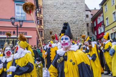 ROTTWEIL , GERMANY - FEB 24 : Participants in the Rottweil Carnival in Rottweil , Germany on February 24 2020.  The carnival known as Fasnacht is a custom in southwest Germany 