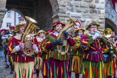 ROTTWEIL , GERMANY - FEB 24 : Participants in the Rottweil Carnival in Rottweil , Germany on February 24 2020.  The carnival known as Fasnacht is a custom in southwest Germany 