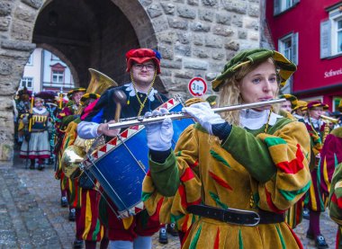 ROTTWEIL , GERMANY - FEB 24 : Participants in the Rottweil Carnival in Rottweil , Germany on February 24 2020.  The carnival known as Fasnacht is a custom in southwest Germany 