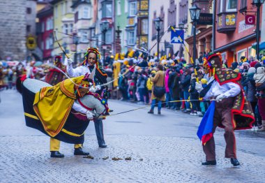 ROTTWEIL , GERMANY - FEB 24 : Participants in the Rottweil Carnival in Rottweil , Germany on February 24 2020.  The carnival known as Fasnacht is a custom in southwest Germany 