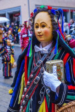 ROTTWEIL , GERMANY - FEB 24 : Participants in the Rottweil Carnival in Rottweil , Germany on February 24 2020.  The carnival known as Fasnacht is a custom in southwest Germany 