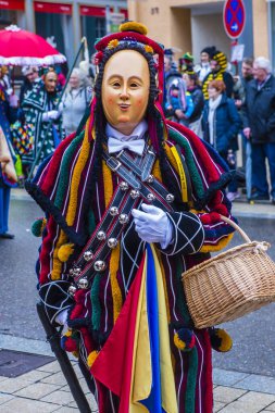 ROTTWEIL , GERMANY - FEB 24 : Participants in the Rottweil Carnival in Rottweil , Germany on February 24 2020.  The carnival known as Fasnacht is a custom in southwest Germany 