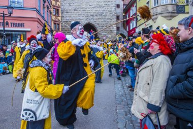 ROTTWEIL , GERMANY - FEB 24 : Participants in the Rottweil Carnival in Rottweil , Germany on February 24 2020.  The carnival known as Fasnacht is a custom in southwest Germany 