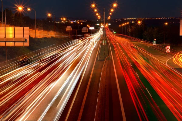 Car lights on the night highway — Stock Photo, Image