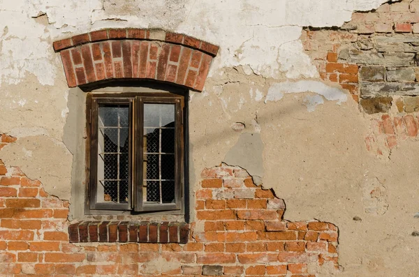 stock image Old wall with wooden window