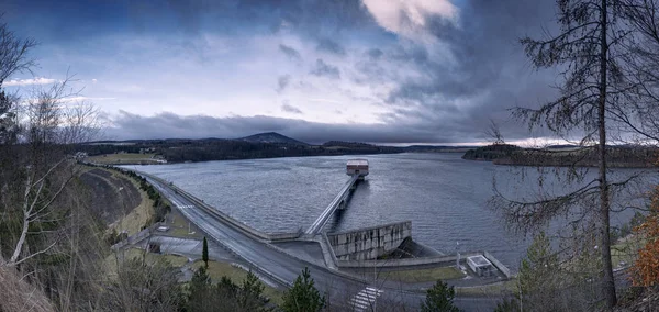 Slezska Harta dam with dark dramatic clouds and Roudny on the background, Roudno, Czech Republic — Stock Photo, Image