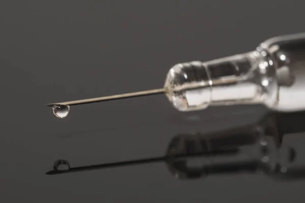 Detalhe da seringa com ponto de reboco — Fotografia de Stock